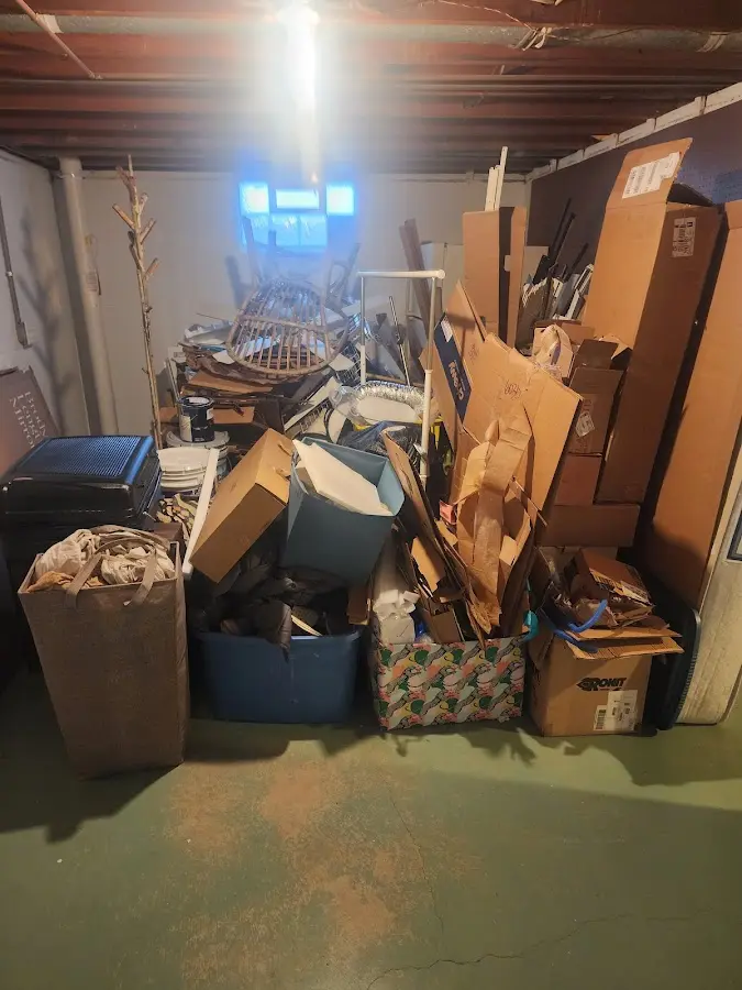 Roll-off dumpster container at job site for 2 Yard Dumpster Rental in Island Park